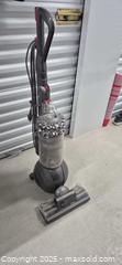 MaxSold Auction: Dyson DC77 Upright Ball Corded Vacuum (Gunmetal/Red) - Markham (Ontario, Canada) PARTNER MANAGED Downsizing Online Auction - Mccowan Road (STORAGE)