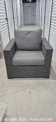 MaxSold Auction: Gray Charcoal Rattan Patio Armchair with Cushions - Markham (Ontario, Canada) PARTNER MANAGED Downsizing Online Auction - Mccowan Road (STORAGE)