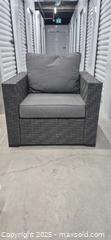 MaxSold Auction: Gray Charcoal Rattan Patio Armchair with Cushions - Markham (Ontario, Canada) PARTNER MANAGED Downsizing Online Auction - Mccowan Road (STORAGE)