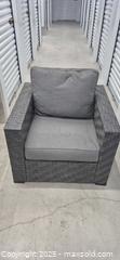 MaxSold Auction: Gray Charcoal Rattan Patio Armchair with Cushions - Markham (Ontario, Canada) PARTNER MANAGED Downsizing Online Auction - Mccowan Road (STORAGE)