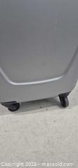MaxSold Auction: Heys Silver Hardside Carry-On Spinner Approx. 22–23 in - Markham (Ontario, Canada) PARTNER MANAGED Downsizing Online Auction - Mccowan Road (STORAGE)