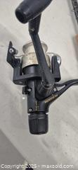MaxSold Auction: Lot of 4 Fishing Rods with Spinning Reels - Markham (Ontario, Canada) PARTNER MANAGED Downsizing Online Auction - Mccowan Road (STORAGE)