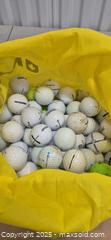 MaxSold Auction: Lot of Approximately 40–60 Mixed Colored Golf Balls with Bag - Markham (Ontario, Canada) PARTNER MANAGED Downsizing Online Auction - Mccowan Road (STORAGE)