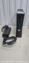 MaxSold Auction: Microsoft Xbox 360 Slim (S) Black Console - Markham (Ontario, Canada) PARTNER MANAGED Downsizing Online Auction - Mccowan Road (STORAGE)