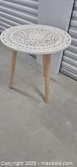 MaxSold Auction: Round 24" Carved White Accent Table with Natural Wood Legs - Markham (Ontario, Canada) PARTNER MANAGED Downsizing Online Auction - Mccowan Road (STORAGE)