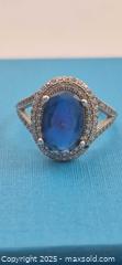MaxSold Auction: Sterling Silver Oval Synthetic Sapphire Halo Split-Shank Ring - Markham (Ontario, Canada) PARTNER MANAGED Downsizing Online Auction - Mccowan Road (STORAGE)