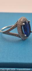MaxSold Auction: Sterling Silver Oval Synthetic Sapphire Halo Split-Shank Ring - Markham (Ontario, Canada) PARTNER MANAGED Downsizing Online Auction - Mccowan Road (STORAGE)