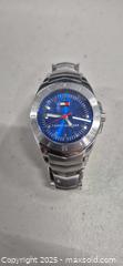 MaxSold Auction: Tommy Hilfiger Quartz Watch, 38mm Blue Dial - Markham (Ontario, Canada) PARTNER MANAGED Downsizing Online Auction - Mccowan Road (STORAGE)