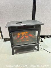 MaxSold Auction: Duraflame Electric Freestanding Stove / Fireplace Heater, Matte Black - Warwick (Rhode Island, USA) SELLER MANAGED Reseller Online Auction - Warwick Avenue