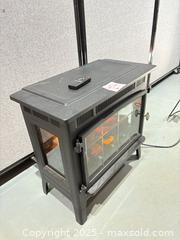 MaxSold Auction: Duraflame Electric Freestanding Stove / Fireplace Heater, Matte Black - Warwick (Rhode Island, USA) SELLER MANAGED Reseller Online Auction - Warwick Avenue