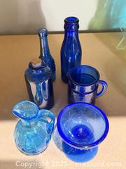 MaxSold Auction: Lot of 6 Decorative Glass Bottles, Light & Cobalt Blue - Warwick (Rhode Island, USA) SELLER MANAGED Reseller Online Auction - Warwick Avenue