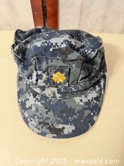MaxSold Auction: Navy Cover with Officer Insignia, 2 Math Books & Hanging Organizer - Warwick (Rhode Island, USA) SELLER MANAGED Reseller Online Auction - Warwick Avenue