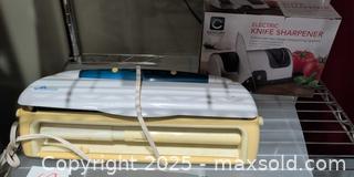 MaxSold Auction: Rival VS110 Vacuum Food Sealer with Boxed Cutting Utensil Sharpener - Warwick (Rhode Island, USA) SELLER MANAGED Reseller Online Auction - Warwick Avenue