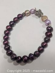 MaxSold Auction: Dyed Purple Fresh Water Pearl Flexible  - Toronto (Ontario, Canada) PARTNER MANAGED Downsizing Online Auction - Queen Street East