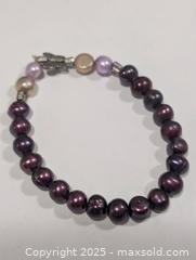 MaxSold Auction: Dyed Purple Fresh Water Pearl Flexible  - Toronto (Ontario, Canada) PARTNER MANAGED Downsizing Online Auction - Queen Street East