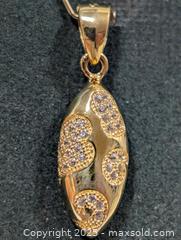 MaxSold Auction: Silver(2.05g)CZ Pendant  - Toronto (Ontario, Canada) PARTNER MANAGED Downsizing Online Auction - Queen Street East