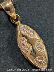 MaxSold Auction: Silver(2.05g)CZ Pendant  - Toronto (Ontario, Canada) PARTNER MANAGED Downsizing Online Auction - Queen Street East