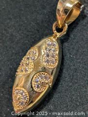 MaxSold Auction: Silver(2.05g)CZ Pendant  - Toronto (Ontario, Canada) PARTNER MANAGED Downsizing Online Auction - Queen Street East