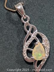 MaxSold Auction: Silver(2.19g)Opal Pendant  - Toronto (Ontario, Canada) PARTNER MANAGED Downsizing Online Auction - Queen Street East