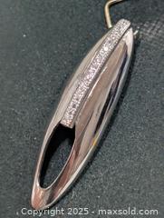 MaxSold Auction: Silver(2.26g)CZ Pendant  - Toronto (Ontario, Canada) PARTNER MANAGED Downsizing Online Auction - Queen Street East