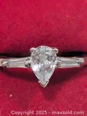 MaxSold Auction: Silver(2.64g)CZ Ring,size 7  - Toronto (Ontario, Canada) PARTNER MANAGED Downsizing Online Auction - Queen Street East