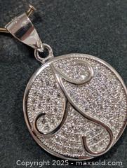 MaxSold Auction: Silver(2.69g)CZ Pendant  - Toronto (Ontario, Canada) PARTNER MANAGED Downsizing Online Auction - Queen Street East