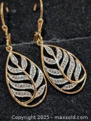 MaxSold Auction: Silver(3.48g) Diamond(0.20ct) Earring  - Toronto (Ontario, Canada) PARTNER MANAGED Downsizing Online Auction - Queen Street East