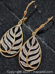 MaxSold Auction: Silver(3.48g) Diamond(0.20ct) Earring  - Toronto (Ontario, Canada) PARTNER MANAGED Downsizing Online Auction - Queen Street East