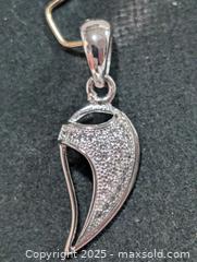 MaxSold Auction: Silver Pendant  - Toronto (Ontario, Canada) PARTNER MANAGED Downsizing Online Auction - Queen Street East