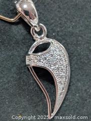 MaxSold Auction: Silver Pendant  - Toronto (Ontario, Canada) PARTNER MANAGED Downsizing Online Auction - Queen Street East