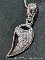 MaxSold Auction: Silver Pendant  - Toronto (Ontario, Canada) PARTNER MANAGED Downsizing Online Auction - Queen Street East