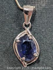 MaxSold Auction: Silver Sapphire Pendant  - Toronto (Ontario, Canada) PARTNER MANAGED Downsizing Online Auction - Queen Street East