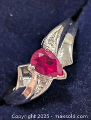 MaxSold Auction: Silver Synthetic Ruby Ring,size 7  - Toronto (Ontario, Canada) PARTNER MANAGED Downsizing Online Auction - Queen Street East