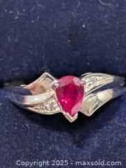 MaxSold Auction: Silver Synthetic Ruby Ring,size 7  - Toronto (Ontario, Canada) PARTNER MANAGED Downsizing Online Auction - Queen Street East