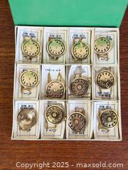 MaxSold Auction: Vintage 'New-Old-Stock' Rotary Phone Dial Pendant Necklaces - Hamilton (Ontario, Canada) SELLER MANAGED Estate Sale Online Auction - Gertrude Street
