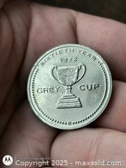 MaxSold Auction: 1972 Grey Cup Football Token - South Frontenac (Ontario, Canada) SELLER MANAGED Downsizing Online Auction - Battersea Road