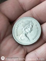 MaxSold Auction: 1975 Canada Dollar Coin UNC - South Frontenac (Ontario, Canada) SELLER MANAGED Downsizing Online Auction - Battersea Road