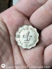 MaxSold Auction: Hongkong 2 dollar Coin scalloped edges  - South Frontenac (Ontario, Canada) SELLER MANAGED Downsizing Online Auction - Battersea Road
