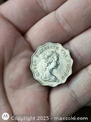 MaxSold Auction: Hongkong 2 dollar Coin scalloped edges  - South Frontenac (Ontario, Canada) SELLER MANAGED Downsizing Online Auction - Battersea Road