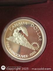 MaxSold Auction: Proof Strike Silver Train Dollar of Canada 1986 - South Frontenac (Ontario, Canada) SELLER MANAGED Downsizing Online Auction - Battersea Road