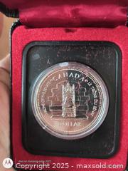 MaxSold Auction: The Throne of Queen Elizabeth Silver Dollar 1977 UNC - South Frontenac (Ontario, Canada) SELLER MANAGED Downsizing Online Auction - Battersea Road