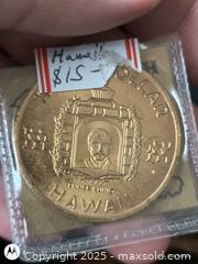 MaxSold Auction: UNC Hawian Coin in holder - South Frontenac (Ontario, Canada) SELLER MANAGED Downsizing Online Auction - Battersea Road