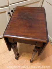 MaxSold Auction: ANTIQUE 1930s APARTMENT SIZE GATE LEG WALNUT TABLE - Loyalist (Ontario, Canada) SELLER MANAGED Downsizing Online Auction - Main Street