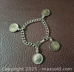 MaxSold Auction: Silver Canadian Coins Bracelet  - Toronto (Ontario, Canada) PARTNER MANAGED Reseller Online Auction - Queen Street West