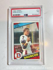 MaxSold Auction: 1984 Topps #63 JOHN ELWAY Graded PSA 7 ROOKIE CARD NM - Denver Broncos Hall of Famer! - Parker (Colorado, USA) SELLER MANAGED Commercial Liquidation Online Auction - Heritage Oak Drive