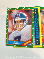MaxSold Auction: 1986 Topps Football Card Team Set Denver Broncos includes John Elway, Karl Mecklenburg RC, Dennis Smith RC, Vance Johnson RC - Parker (Colorado, USA) SELLER MANAGED Commercial Liquidation Online Auction - Heritage Oak Drive