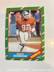 MaxSold Auction: 1986 Topps Football Card Team Set Denver Broncos includes John Elway, Karl Mecklenburg RC, Dennis Smith RC, Vance Johnson RC - Parker (Colorado, USA) SELLER MANAGED Commercial Liquidation Online Auction - Heritage Oak Drive
