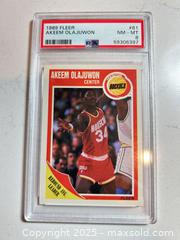 MaxSold Auction: 1989 Fleer #61 AKEEM OLAJUWON Graded Hall of Famer PSA 8 Nm-MT  - Parker (Colorado, USA) SELLER MANAGED Commercial Liquidation Online Auction - Heritage Oak Drive