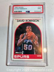 MaxSold Auction: 1989 Hoops #310 DAVID ROBINSON Graded Hall of Famer ROOKIE CARD PSA 9 Mint - Parker (Colorado, USA) SELLER MANAGED Commercial Liquidation Online Auction - Heritage Oak Drive