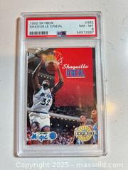 MaxSold Auction: 1992 Skybox #382 SHAQUILLE O'NEAL Graded Hall of Famer ROOKIE CARD PSA 8 NM-Mint - Parker (Colorado, USA) SELLER MANAGED Commercial Liquidation Online Auction - Heritage Oak Drive